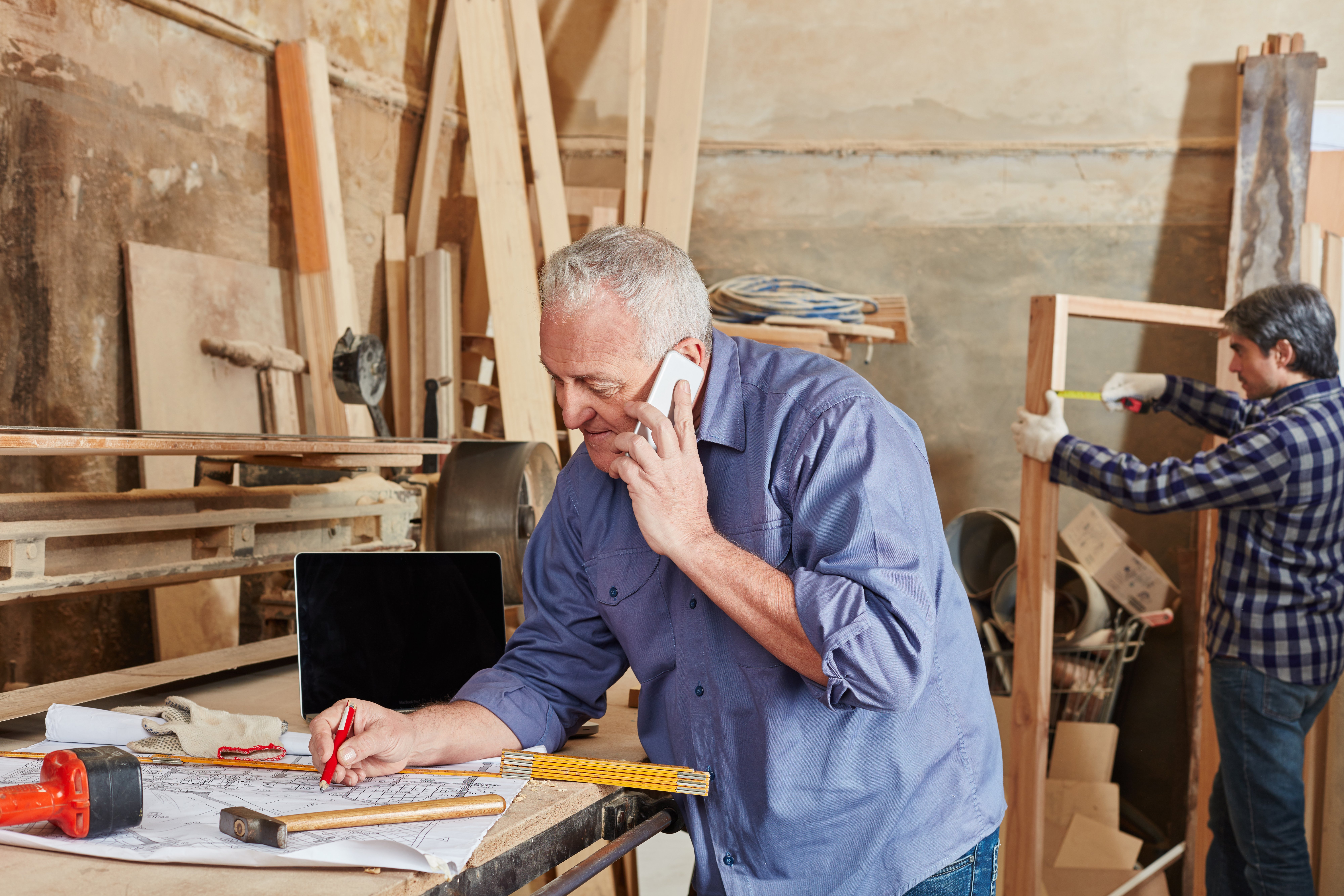 Local tradie on the phone