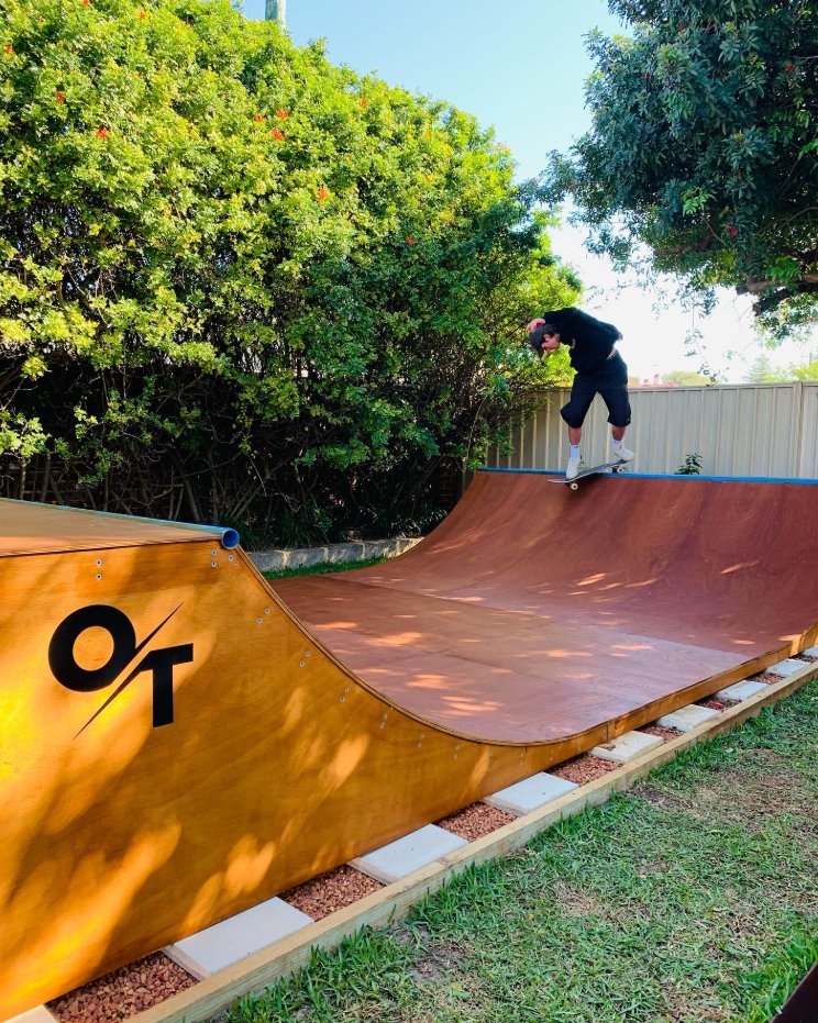 OssyTossy branded skate ramp in a Perth backyard